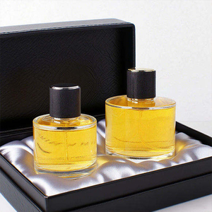 Venta al por mayor de fábrica: Botella de perfume cilíndrica de vidrio transparente vacía de 30ml/50ml/100ml con pulverizador de bomba a presión y tapa con filtro. - Product Image 5