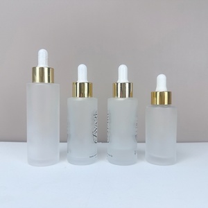 ขวดแก้วสำหรับผลิตภัณฑ์บำรุงผิวแบบมีโลโก้สั่งทำ ขนาด 1 ออนซ์ 15 มล. 30 มล. 50 มล. 100 มล. ขวดแก้วเครื่องสำอางแบบขุ่น ขวดแก้วแบบมีหลอดหยดขนาด 30 มล. แบบไหล่เรียบ - Product Image 2