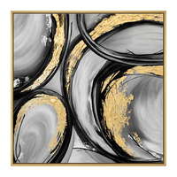 Impression sur toile abstraite moderne à motif tourbillonnant, encadrée or mat, avec détails en feuille d'or noir, gris et or, pour décoration de hall de penthouse et de boutique