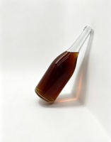 Bouteille de whisky en verre à succès, vente en gros et OEM, bouteille transparente premium à nervures verticales 700ml 750ml pour spiritueux