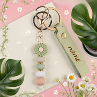 Personalisierter Schlüsselanhänger aus Silikon mit Gänseblümchen-Perlen, Schlüsselring-Armband mit PU-Leder-Armband, elastischer Schlüsselring-Armreif für Frauen als Geschenk