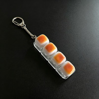 Vente d'usine : Keycaps de clavier en forme de pain caramel, bouton porte-clés, base à 1-16 emplacements, lumière LED, pendentif de sac à dos, gadget anti-stress