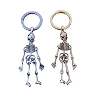 Porte-clés squelette pliable tendance pour hommes et femmes, en argent antique, or, métal, crâne gothique, porte-clés d'Halloween, breloque pour sac