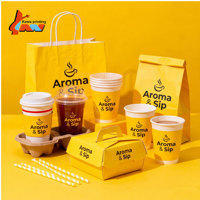 Ensemble d'emballages jaune vif pour café, avec tasses, sacs, boîtes alimentaires, pailles et design du logo Skyline Urbain, pour l'image de marque des chaînes de cafés