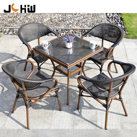 Meubles de terrasse de restaurant modernes en rotin et aluminium, table et chaises de bistrot français, chaise de jardin d'extérieur