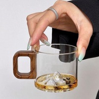Mug en verre transparent à haute teneur en silice borée, petite capacité, avec poignée en bois, résistant à la chaleur, pour la maison, vente en gros directe usine, modèle Mini Vue sur la Montagne