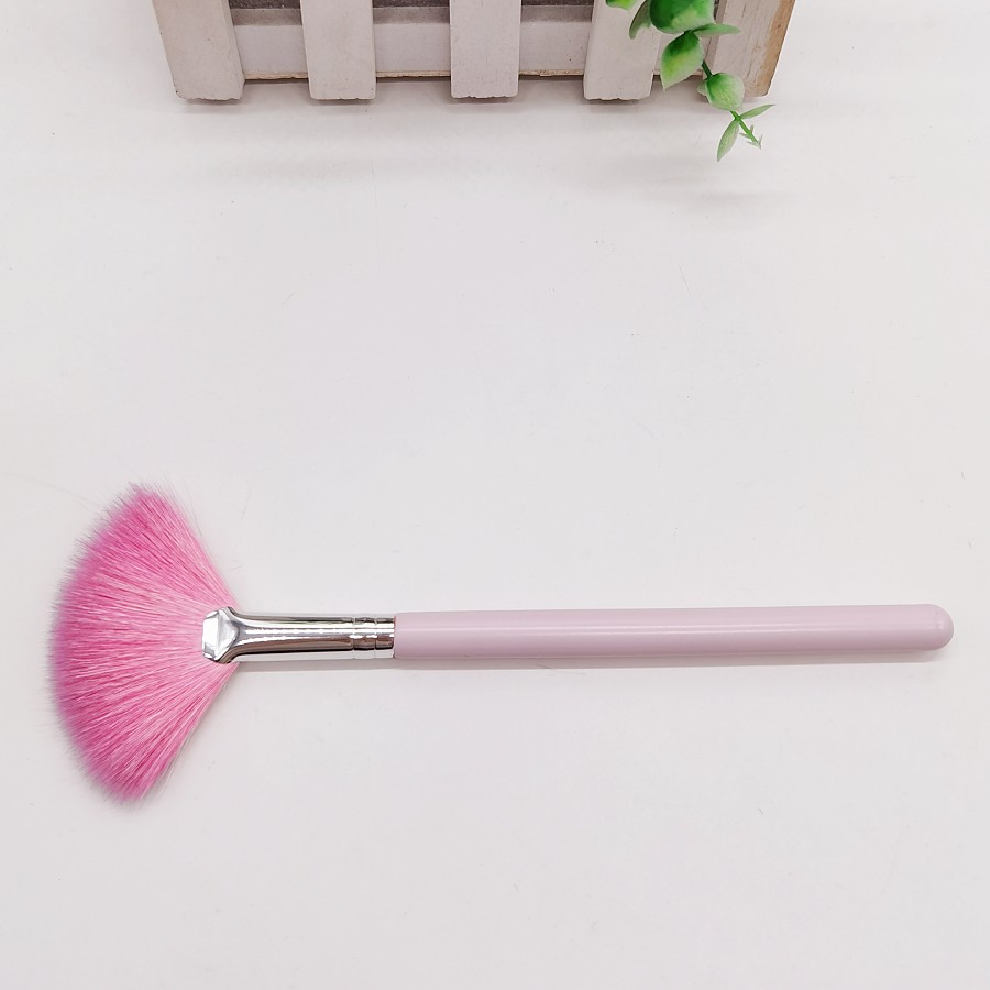 Manche en bois rose cheveu de chèvre rose virole argentée