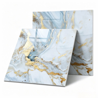 Carrelage en porcelaine effet marbre bleu doré brillant moderne 600x600 pour projets commerciaux et villas au Sénégal - Vente en gros