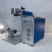 Imprimante de marquage laser UV à mise au point automatique de type séparé 3W 5W 10W pour la gravure de bouteilles en verre de haute précision