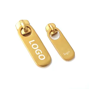 Yüksek kaliteli altın Zip çektirme çekme kaymak tasarım Metal Logo konfeksiyon fermuar etiketi