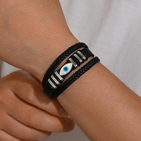 Nouveau bracelet en cuir véritable tressé à double brin avec fermoir magnétique en acier inoxydable de style vintage et breloque œil bleu pour homme