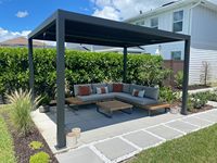 Pergola bioclimatique en aluminium robuste avec stores rétractables, système d'ombrage électrique et motorisé imperméable pour usage extérieur