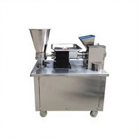 Machine automatique à raviolis pour la fabrication d'empanadas, de pelmenis, de samosas, de pierogis, de wontons et de rouleaux de printemps