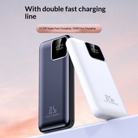 Batterie externe portable en promotion avec une grande capacité de 10000 mAh, charge rapide 22,5 W, câble intégré et impression de logo personnalisable