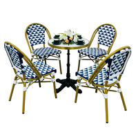 Ensemble de table et chaises de salle à manger d'extérieur en métal et rotin, design français durable, pour usage commercial en boutique, laiterie, restaurant, café