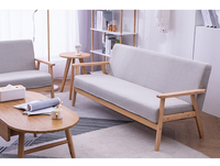 Le style japonais d'OEM conçoit le fauteuil tapissé de bois de tissu pour le salon avec la chaise de sofa de jambes en bois solide