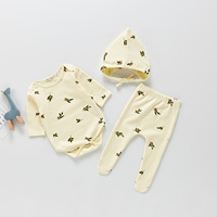 Ensemble de barboteuse pour bébé Angou, version coréenne, nouveau printemps et automne, barboteuse imprimée, pantalon à pieds, chapeau, ensemble trois pièces