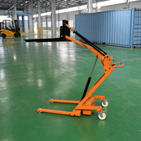 Mini chariot élévateur électrique d'une capacité de charge de 500 kg, adapté à une utilisation comme petit transpalette électrique dans les ateliers