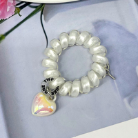 Élastique à cheveux en plastique souple 2-en-1, type chouchou et bracelet, avec breloques étoiles de dessin animé colorées, élastique fait main, style mignon pour filles et fêtes