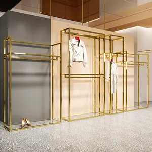 Estante de exhibición de tienda de ropa personalizado, soporte de exhibición de ropa de acrílico, estante de ropa dorado con espejo de acero inoxidable de 2 capas para Boutique