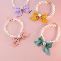 2023 vente en gros nouveau haute qualité classique perle mignon collier pour animaux de compagnie chien bijoux luxe chat collier GPS Tracker avec cloche arc