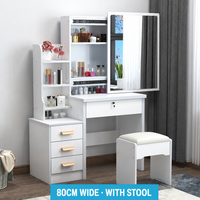 Coiffeuse de chambre moderne et minimaliste pour petits espaces, avec miroir coulissant, compartiments de rangement et un design élégant.