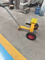 Chariot de transport robuste en fer thermolaqué jaune avec plateau en verre et 2 roues pour la manutention et le traitement des feuilles de verre
