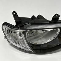 Vente directe d'usine, ensemble de phares avant halogènes, compatible avec les modèles d'origine avec lentille transparente blanche pour Mitsubishi L200 05