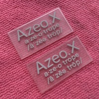 Patch en caoutchouc transparent avec logo surélevé de forme libre, étiquette en caoutchouc PVC transparent pour ligne de couture déprimée pour jean