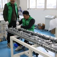 Ligne de convoyage modulaire automatique à rail annulaire pour cellules de fabrication flexibles, lignes d'assemblage intelligentes à circulation multi-stations