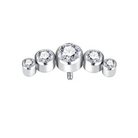 Vente en gros de bijoux de piercing corporel tendance en titane ASTM F136 plaqué or, certifiés IGI, avec grappe de 3 pierres CZ serties à l'intérieur et à la façon de la pierre.