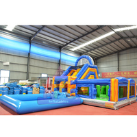 Grand château gonflable arc-en-ciel avec toboggan aquatique double piste et piscine, usage commercial, grande capacité, pour fêtes d'enfants