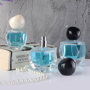 Bouteilles en <span class=keywords><strong>verre</strong></span> de parfum populaires 30ML 50ML 100ML bouteilles de parfum de forme irrégulière avec couvercle Bailey de pulvérisateur puissant - Product Image 1