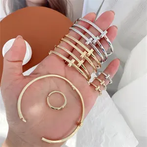 Pulsera cruzada de cadena chapada en oro de 24K para mujer, brazalete ajustable de 2 capas, anillo de espiga cruzada, conjunto de joyería de Hip Hop 2023