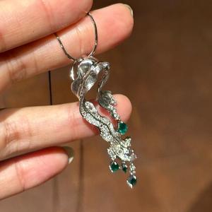 สร้อยคอเงินแท้ S925 จี้รูปหัวใจผิวสัมผัสไม่เรียบ ประดับด้วยเพทายสีฟ้า ดีไซน์เฉพาะตัว หรูหราเบาๆ สีพีช - Product Image 1