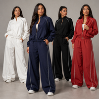 Ensemble deux pièces pour femme Joydressing : veste de survêtement marine zippée et pantalon large avec passepoil contrastant
