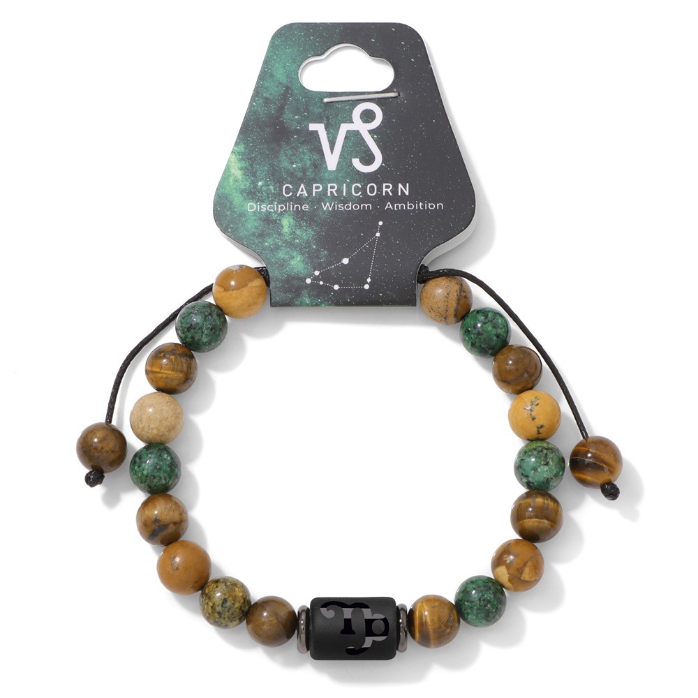 Bracelet tissé avec pendentif Capricorne en pierre tigre jaune de pin africain.