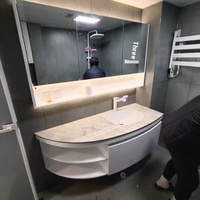 Lavabo en céramique moderne tout-en-un armoire de salle de bain plaque de roche évier à arc circulaire miroir de bain toilette lavabo combinaison MDF