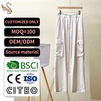 Pantalon cargo blanc laiteux personnalisé pour femme, coupe droite texturée, avec poches à rabat boutonnées, style utilitaire, OEM ODM BSCI