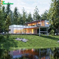Maison préfabriquée de luxe de 20 pieds 40 pieds avec 2 chambres à coucher Maison modulaire en acier léger Cuisine Design en verre Maison à capsule capsule pour villa de luxe