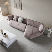 Canapé d'angle modulable en velours uni pour salon d'appartement