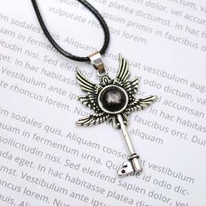 Venta caliente 3,5 cm cristal natural Aleación de obsidiana natural con incrustaciones de collar de llave de alas de poder de Dios guardián - Product Image 3