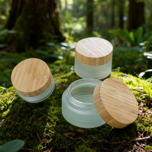 Venta al por Mayor de Frascos de Vidrio Esmerilado de 5g-100g con Tapas de Bambú para Manteca Corporal Natural y Envases Cosméticos (Logotipo Personalizable) - Product Image 1