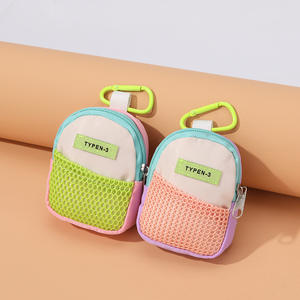 Mini llavero creativo con colgante portátil y bolsa de almacenamiento de monedas, nuevo estilo, llavero para auriculares - Product Image 1