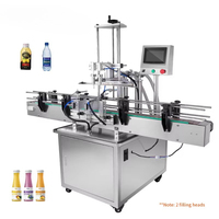 Machine de remplissage électrique automatique à quatre têtes haute vitesse pour bouteilles de boissons en verre de 200 ml (eau, lait, thé et jus)
