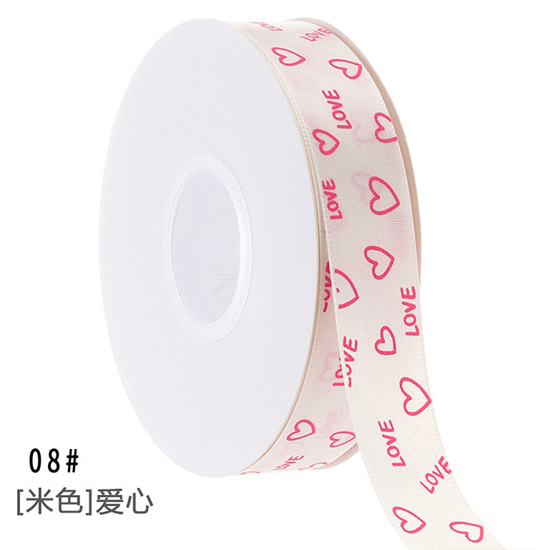 Rollo de 25 cm x 36 m con forma de corazón beige.
