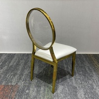 Luxuriöse, schicke goldene Eisenstühle mit schwebendem Acryl-Design für hochwertige moderne Hochzeitsbankett-Sitzgelegenheiten