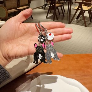 Llavero colgante de metal con etiquetado en dos colores (negro y blanco), diseño de toro de corrida, estilo lindo y creativo de dibujos animados, joyería para bolso, venta al por mayor - Product Image 1