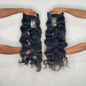 Fournisseur en gros de mèches de cheveux humains indiens bruts, non traités, à cuticules alignées, ondulés et bouclés, avec des ondulations naturelles. - Product Image 2