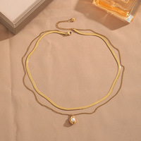 Collier à pendentif superposé le plus vendu, collier en acier inoxydable double couche doré et tendance avec pendentif en perle